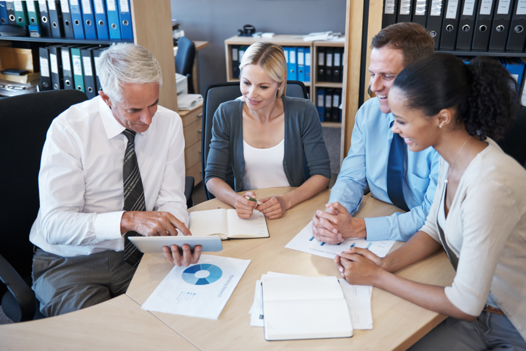 A team talking over some documents